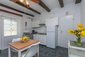 Kuchyň nebo kuchyňský kout v ubytování Apartments Porto Duce