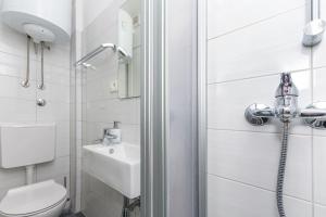 Koupelna v ubytování Apartments Porto Duce
