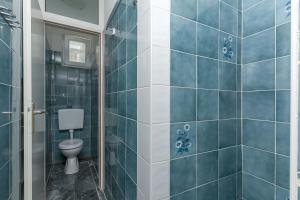 Koupelna v ubytování Apartments Porto Duce