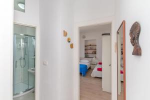 Koupelna v ubytování Apartments Porto Duce