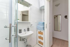 Koupelna v ubytování Apartments Porto Duce