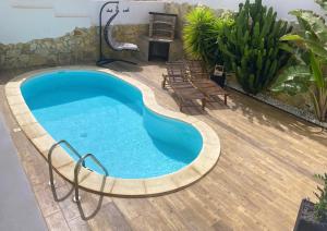 Bazén v ubytovaní Exclusiva Villa de Lujo (5*****) en Corralejo - Fuerteventura (Islas Canarias) alebo v jeho blízkosti