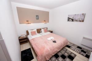 Letto o letti in una camera di Complex Turistic Dávid