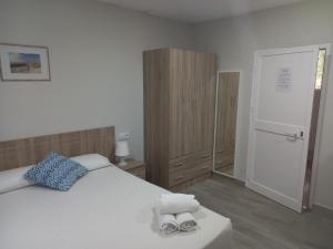 Postel nebo postele na pokoji v ubytování Casa Inocencio