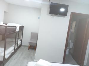 Postel nebo postele na pokoji v ubytování Casa Inocencio