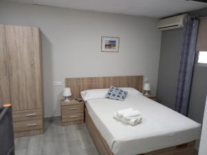 Postel nebo postele na pokoji v ubytování Casa Inocencio