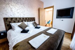 Postel nebo postele na pokoji v ubytování Apartman Sparta Zlatibor