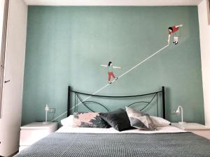 A bed or beds in a room at Bergamondo Még 9 kép