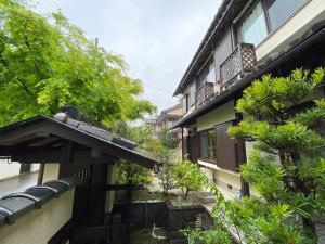 an outside view of a building with a balcony at 金閣京都 in Kyoto +54 photos