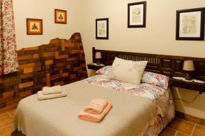 Tempat tidur dalam kamar di Casa Rural Cervarte