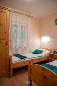 Postel nebo postele na pokoji v ubytování Apartment Balatonfenyves/Balaton 18400