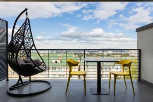 Rõdu või terrass majutusasutuses Tulip Residence & Spa Hotel