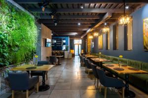 Restoran või mõni muu söögikoht majutusasutuses Tulip Residence & Spa Hotel