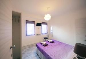 Posteľ alebo postele v izbe v ubytovaní GuestHouse La Viola + 9 fotografií