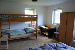 Postelja oz. postelje v sobi nastanitve Apartmán Hulín, Chrášťany - bílý