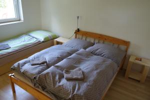 Postelja oz. postelje v sobi nastanitve Apartmán Hulín, Chrášťany - bílý