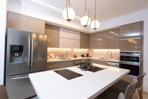 Nhà bếp/bếp nhỏ tại luxury HAUMAJERUS apartments-אירוח יוקרתי בירושלים