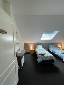 Llit o llits en una habitació de Haus Kristal