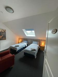A bed or beds in a room at Haus Kristal