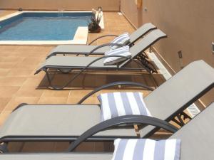 The swimming pool at or close to Villa Amistad