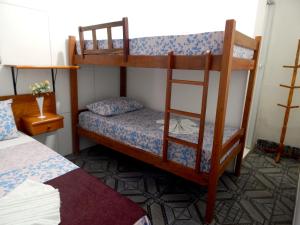 Postel nebo postele na pokoji v ubytování Praia Hostel