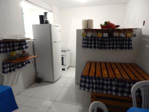 Kuchyň nebo kuchyňský kout v ubytování Praia Hostel