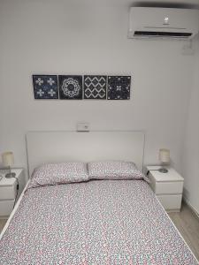 A bed or beds in a room at Albir cosy apartment Még 36 kép