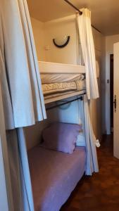 a couple of bunk beds in a room at Gentiane in Les Orres