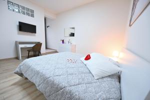 Postel nebo postele na pokoji v ubytování Il Castello Bed&Breakfast