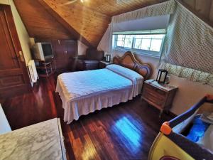 Ένα ή περισσότερα κρεβάτια σε δωμάτιο στο Casa Duarte