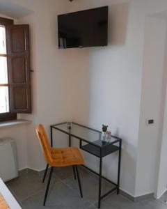 A television and/or entertainment centre at La Terrazza Azzurra