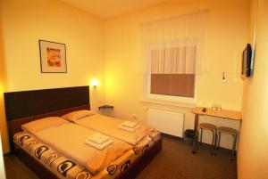Postel nebo postele na pokoji v ubytování Motel Golden Fox