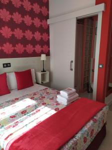 Łóżko lub łóżka w pokoju w obiekcie Hostal Inn Madrid