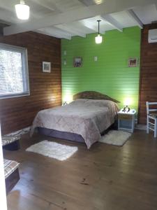 Cama o camas de una habitación en Cabanas El Polista