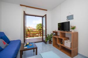 Μια τηλεόραση ή/και κέντρο ψυχαγωγίας στο Apartments Brankica