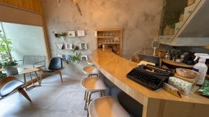 A kitchen or kitchenette at Shan Shan Come Later