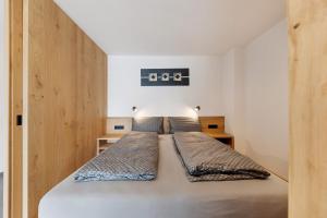 Posteľ alebo postele v izbe v ubytovaní Thalerhof Naturae Rupes