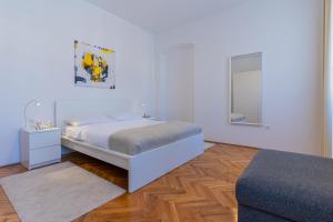 Postel nebo postele na pokoji v ubytování House Catania
