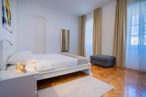 Postel nebo postele na pokoji v ubytování House Catania