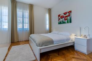 Postel nebo postele na pokoji v ubytování House Catania
