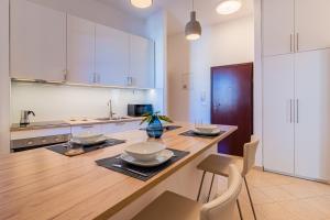 Kuchyň nebo kuchyňský kout v ubytování House Catania
