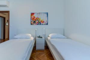 Postel nebo postele na pokoji v ubytování House Catania