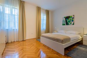 Postel nebo postele na pokoji v ubytování House Catania