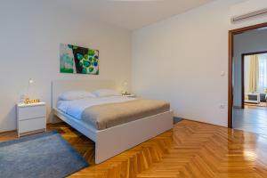 Postel nebo postele na pokoji v ubytování House Catania