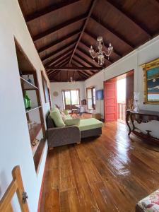 a living room with a couch and a table at Casa Ayane in Santa Cruz de la Palma