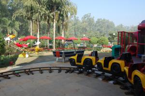 a train on a track at a playground at Savoy Greens Karnal in Karnal
