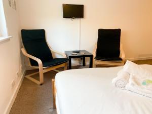 A seating area at Glasgow City Centre Studio Apartment