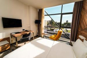 Sjónvarps- og/eða afþreyingartæki á Messier 53 Hotel Yerevan