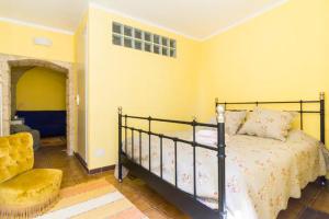 Кровать или кровати в номере Casa Blù