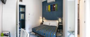 Postel nebo postele na pokoji v ubytování B&B Amalfè